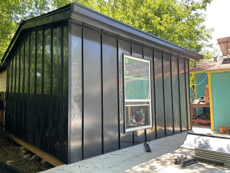 Black standing seam metal wall panels for Metal Roof Installation in Colville