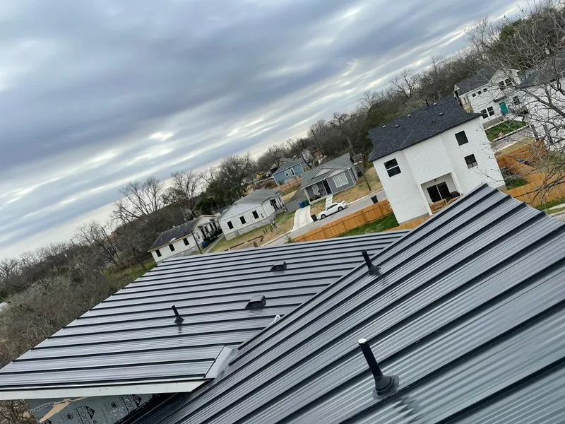 Standing seam metal roof panels with vents for Skylight Repair in Colville